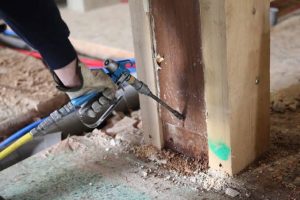 high-pressure liquid-termiticide treatment.